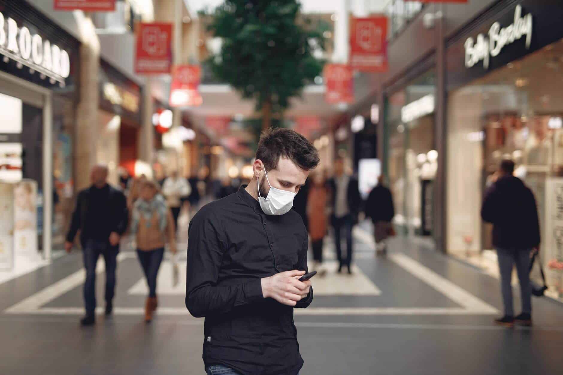 Man With Mask on in Mall