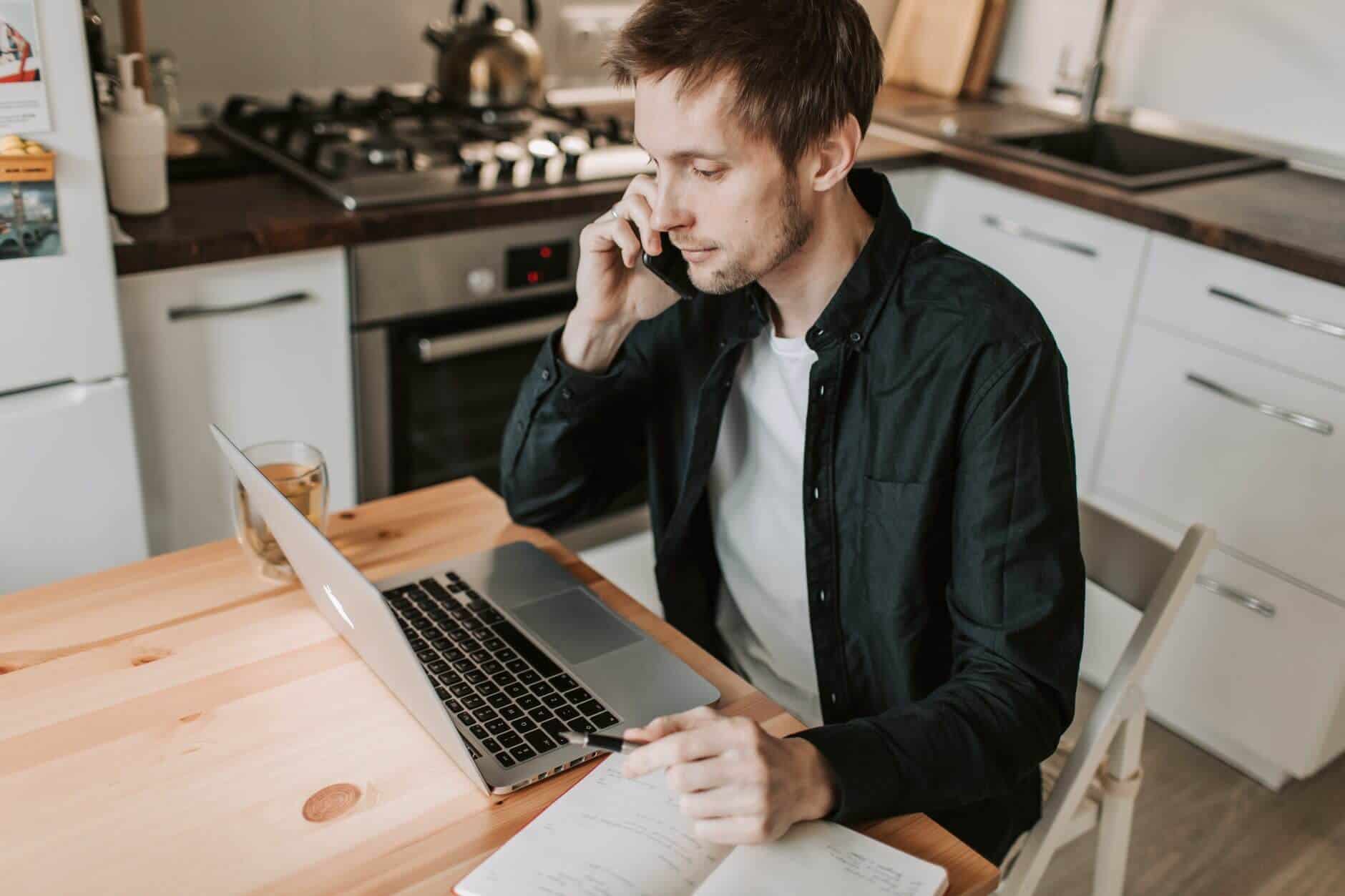 Man Looking at Laptop